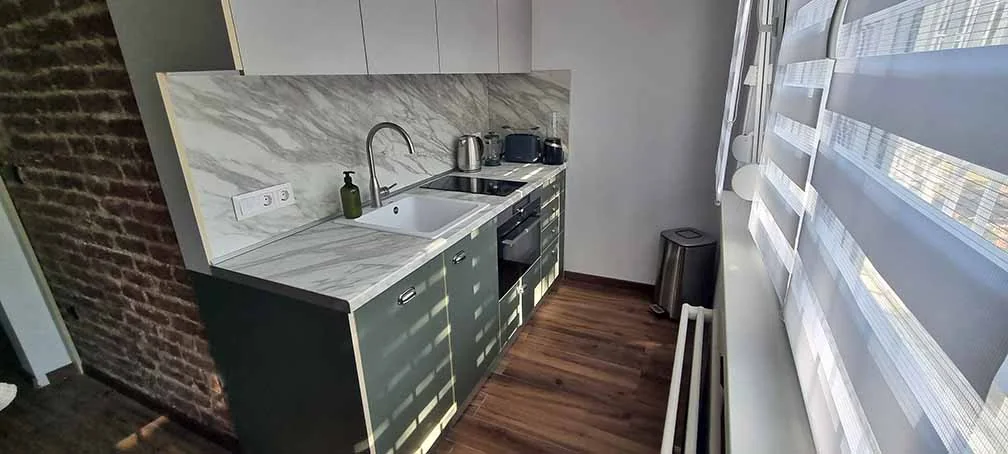 Modern kitchen with marble-style worktop